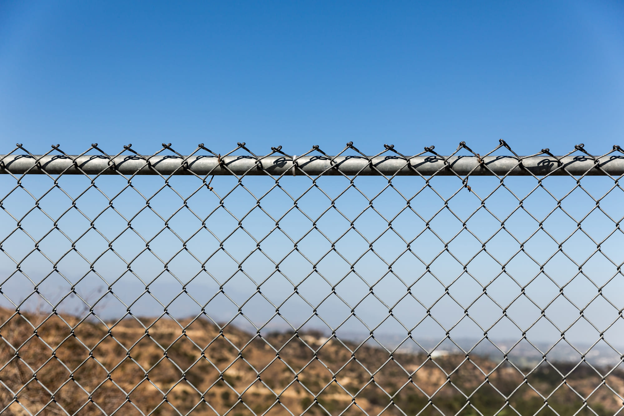 Metal chain-link fence 